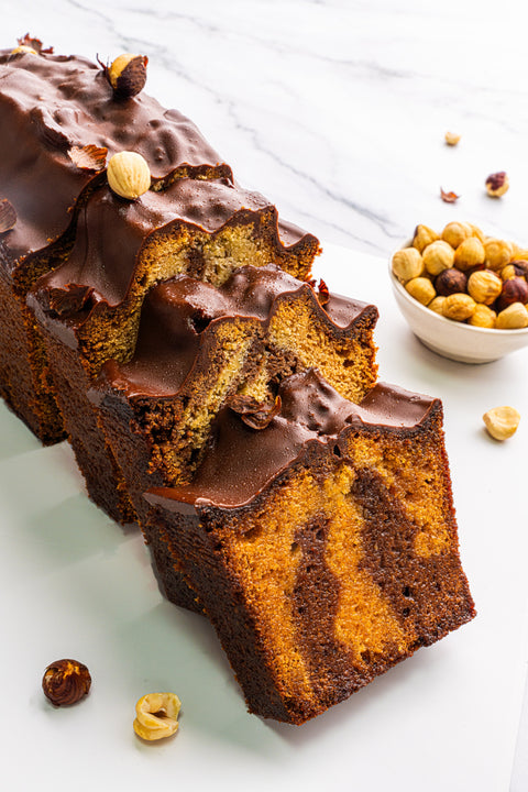 Image of Marble Cake from Laura's Home Bakery, showcasing its marbled blend of rich chocolate and vanilla.
