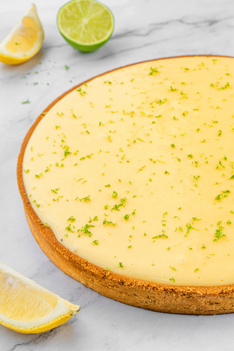 Image of a Lemon Tart from Laura's Home Bakery, showcasing its buttery, flaky crust and luscious lemon curd filling