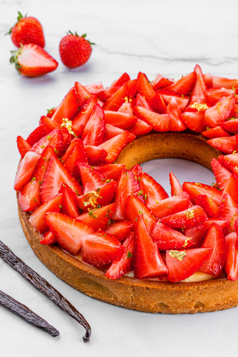 Image of Strawberry Tart from Laura's Home Bakery, showcasing ripe strawberries atop a delicate pastry crust, a visual delight.