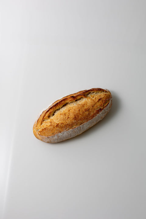 Loaf of bread on a light gray background